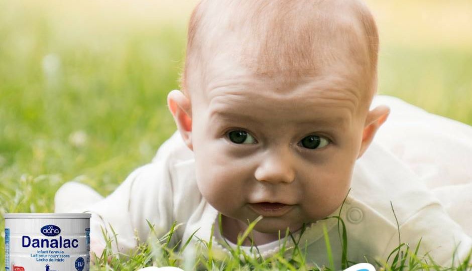baby has some tummy-time over the grass